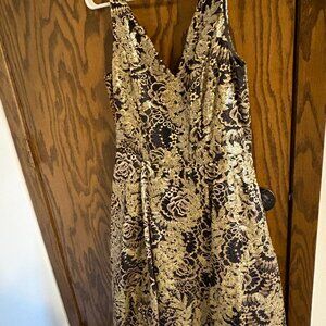 Black and gold sequin gown